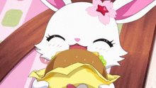 a cartoon rabbit with a pink flower on her head is eating a hamburger