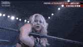 a woman in a wrestling ring with the words cinderella tournament on the top