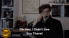 a man talking on a cell phone with the words oh hey i did n't see you there