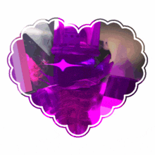 a purple heart shaped sticker with a purple hand in the center