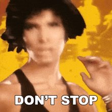 a blurry picture of a woman with the words " do n't stop " written on the bottom