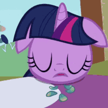twilight sparkle from my little pony is sleeping on the ground