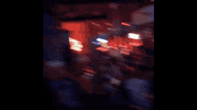 a close up of a person 's face with a blurry background