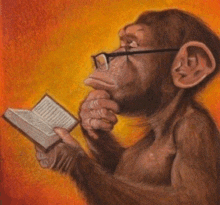 a monkey wearing glasses is holding a book