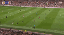 a soccer game is being played with the score 0-0
