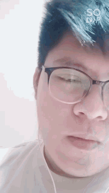 a close up of a person 's face with the word so on the bottom
