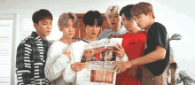 Exo Reading Newspaper GIF - Exo Reading Newspaper Curious GIFs