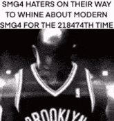 a black and white photo of a basketball player with the words smg4 haters on their way