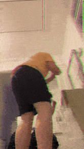 a blurry picture of a person standing in front of a window