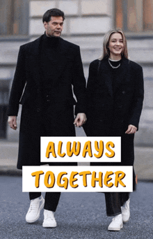 a man and a woman are walking down a street with a sign that says " always together "