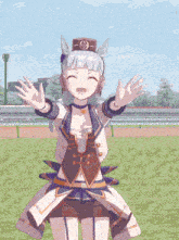 a girl in a horse costume is standing on a field with her arms outstretched and smiling
