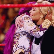 Sasha Banks Natalya GIF - Sasha Banks Natalya Hug GIFs