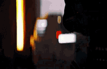 a blurry picture of a person in a dark room