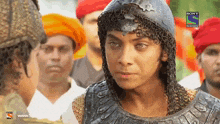 a sony television ad is displayed on the screen of a man in armor