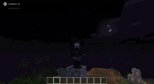 a screenshot of a minecraft game with the letters j and i on the screen