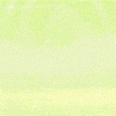 a cartoon character with long hair and a red dress is standing on a green surface .