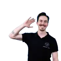 a man in a black shirt that says coach joe on it