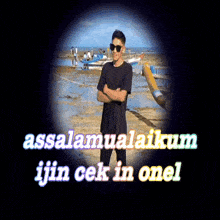a man standing on a beach with the words assalamualaikum ijiin cek in onel