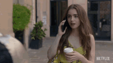 Hang Up Phone Lily Collins GIF - Hang Up Phone Lily Collins Emily Cooper GIFs