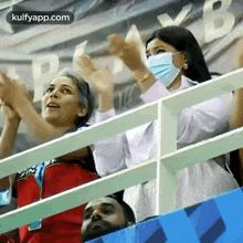 Cheer For Your Loved By Wearing Mask.Gif GIF - Cheer For Your Loved By Wearing Mask Mask Cheer GIFs
