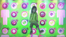 billie eilish is dancing on a stage surrounded by circles and eyes