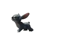 a blue stuffed animal with big ears is standing on its hind legs on a white background