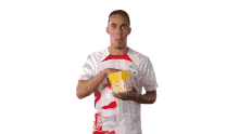 eating popcorn yussuf poulsen rb leipzig snacking eating a handful of popcorn