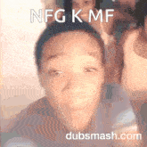 a blurred image of a person 's face with the words nfg k mf dubsmash.com at the bottom