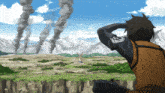 a man looks out over a landscape with smoke coming from the mountains