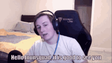 a man wearing headphones is sitting in a secret lab gaming chair