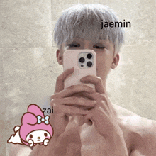 a shirtless man is taking a picture of himself in a mirror with the name jaemin on top