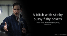 a man holding a microphone with a quote from marco rubio on it