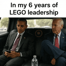 two men in suits and ties are sitting in the back seat of a car with the words in my 6 years of lego leadership below them