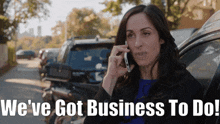 a woman is talking on a cell phone with the words we 've got business to do below her