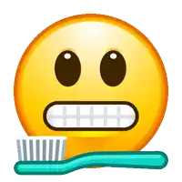 a smiley face is holding a toothbrush with toothpaste on it