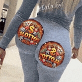 a woman 's butt has a sticker on it that says slotto