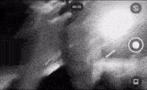 a black and white photo of a person with a timer of 00:00
