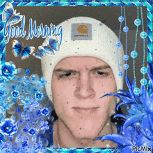 a man wearing a carhartt beanie is surrounded by blue butterflies and flowers