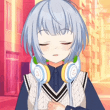 a girl with blue hair is wearing headphones and making a sad face .