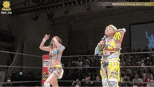two women in a wrestling ring with marigold rising spirit 2025 written on the bottom