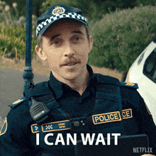 a police officer says i can wait in front of a netflix logo