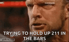 a close up of a man 's face with the words trying to hold up 211 in the bars