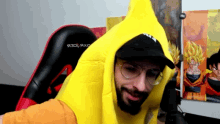 a man wearing a yellow banana costume and glasses