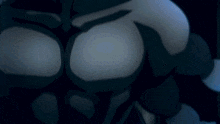a close up of a person 's torso with a blue background