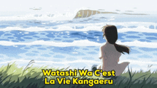 a girl is sitting in the grass looking at the ocean and the words watashi wa c'est la vie kangeru are above her