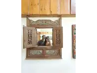 a man and a woman are standing in front of a wooden window