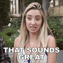 a woman says that sounds great while standing outside