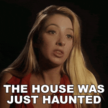 a woman says the house was just haunted on a black background