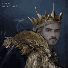 a man wearing a gold crown and feathers is made with reface app