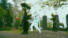 a group of people standing on a sidewalk with one of them holding a sword that says ' samurai ' on it